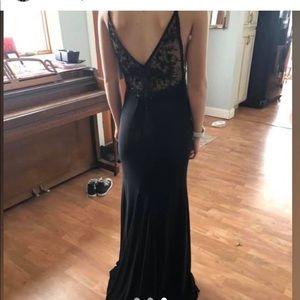 Faviana prom dress. Never worn! Still has tags on it!